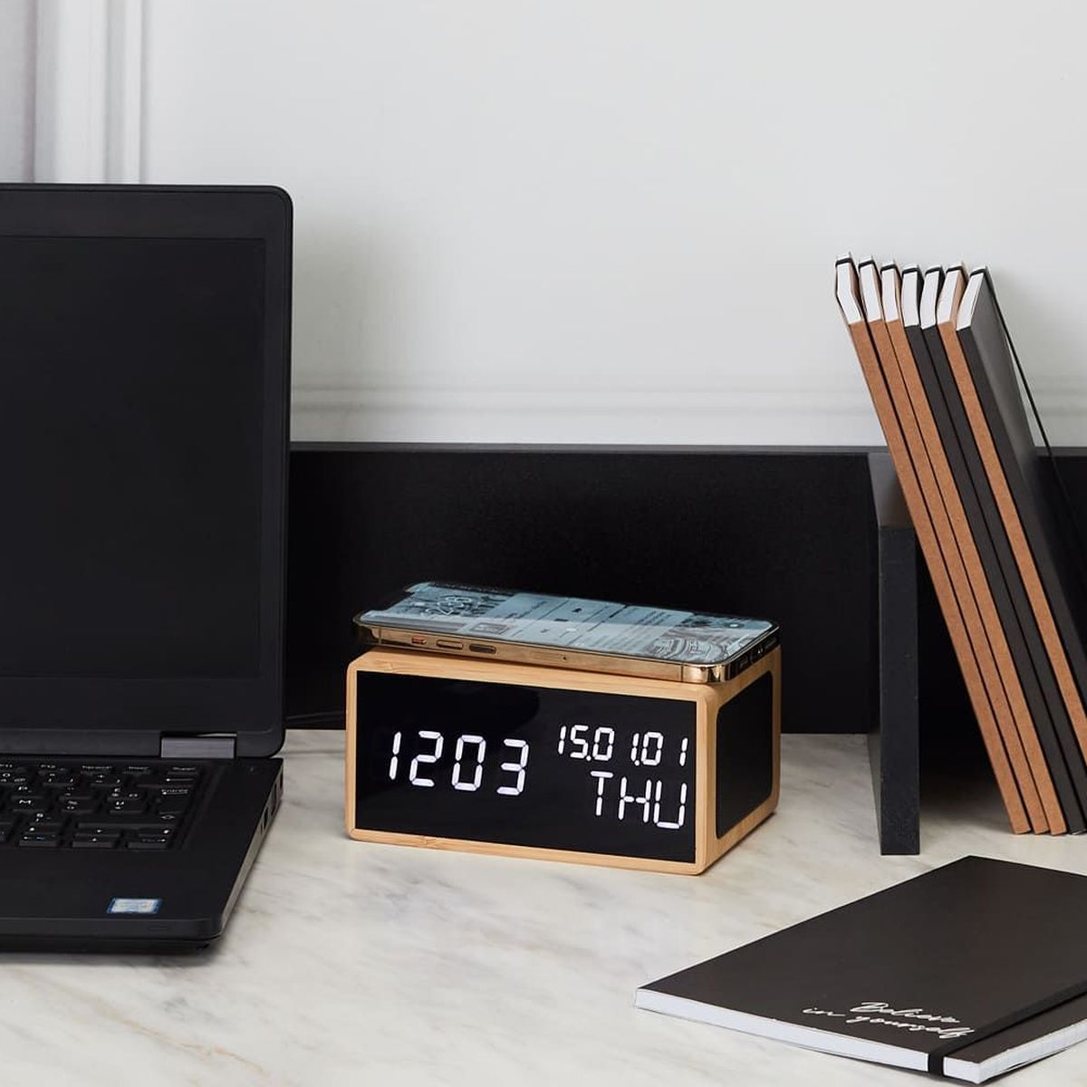 Small alarm clock and induction charger