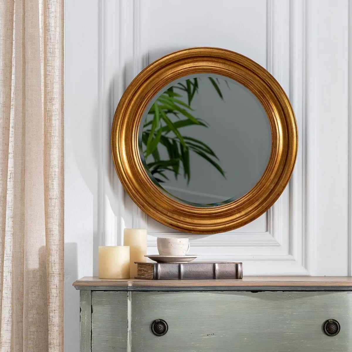 Patinated golden paulownia wall mirror