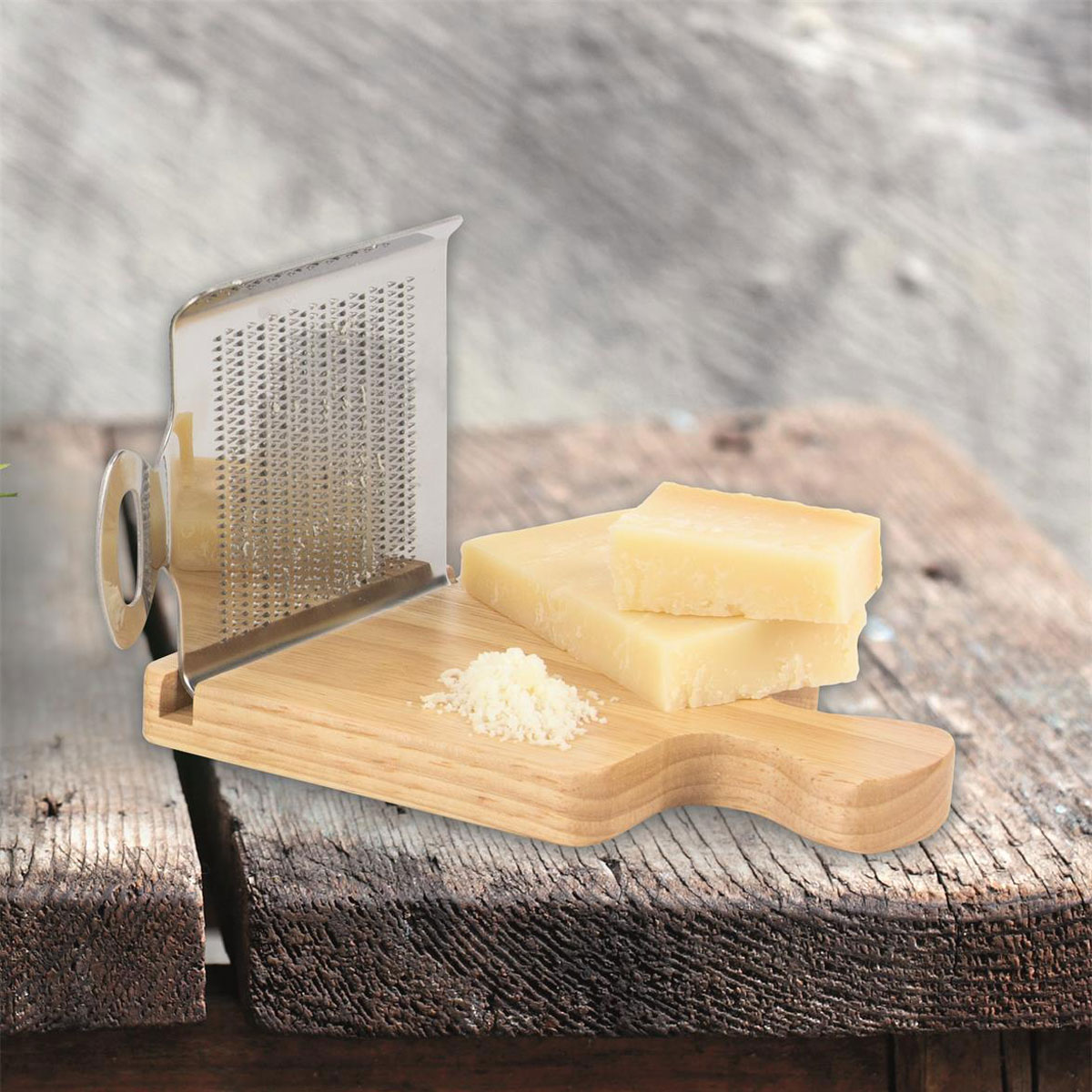 Parmesan grater with its multi-purpose board