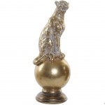 Golden patinated leopard statuette on resin globe