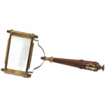Decorative magnifying glass in brass, glass and wood