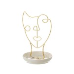 Golden face jewelry holder