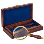 Brass and glass magnifying glass with wooden storage box